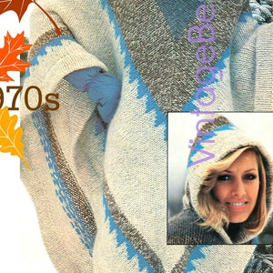 May include: A vintage 1970s hooded poncho in a neutral color palette with blue and brown accents. The poncho features a geometric design and is made of a thick, textured knit material. The text "BOLD & BRIGHT: the great look outdoors" is visible.