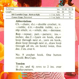 May include: A vintage crochet pattern page with text and a pink crocheted garment. The text includes abbreviations, measurements in inches, and instructions for a bodice pattern. The page is set against a pink background with floral accents.