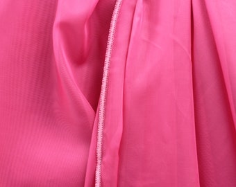 Voile sheer fabric in pink, Marley Piombo Color 046, 110" wide w/chain weights on bottom,