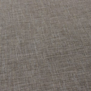 May include: A close-up of a light brown fabric with a woven texture.