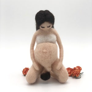 Pregnant doll giving birth, made entirely by hand in carded wool