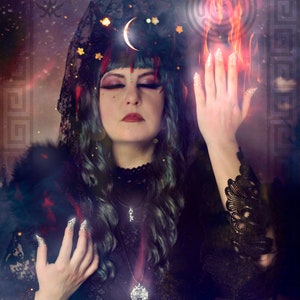 May include: A woman with dark blue hair and a black lace veil, wearing a black dress with a silver pendant, stands with her hands raised in front of a background of flames and a swirling galaxy.