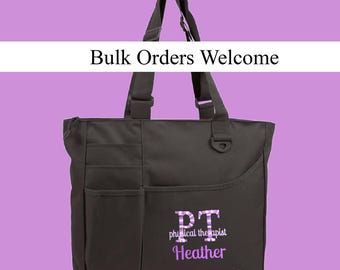 May include: A black tote bag with two shoulder straps, featuring the text Bulk Orders Welcome, the letters PT in a purple plaid pattern, the words physical therapist, and the name Heather in purple text on the front exterior pocket.