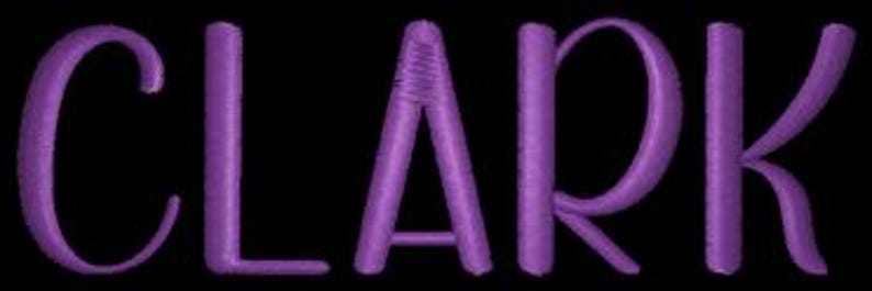 May include: Purple embroidered name "CLARK" on a black background.