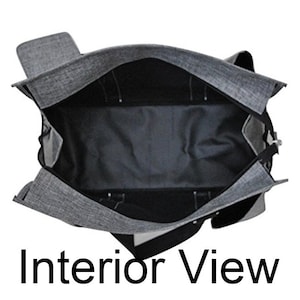 May include: Interior view of a gray and black tote bag. The bag is open, revealing a spacious black interior with multiple compartments. The exterior is a textured gray fabric. The text "Interior View" is at the bottom of the image.