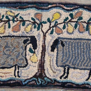 May include: A hooked rug depicting two sheep standing under a pear tree with brown branches and green leaves. The pears are yellow, orange, and brown. The sheep are gray with black outlines and white legs. The rug has a brown, blue, and white border.