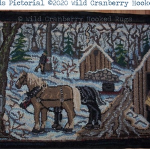 May include: A hooked rug depicting a winter scene with a horse-drawn sleigh, a small cabin, and trees. The rug is made with a variety of colours, including brown, blue, white, and green. The text "Sugar Woods Pictorial ©2020 Wild Cranberry Hooked Rugs" is visible in the top left corner of the rug.