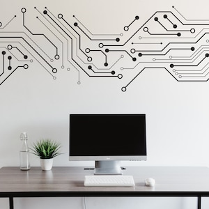 May include: A white desk with a black computer monitor, a keyboard, a mouse, a glass bottle, and a potted plant. The wall behind the desk has a black and white circuit board design.