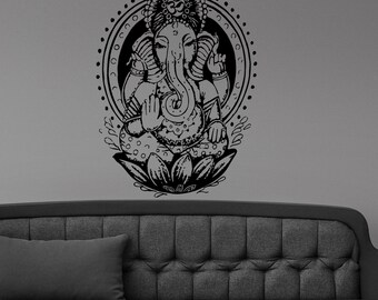 May include: Black and white illustration of Ganesha, the Hindu god of wisdom and prosperity, sitting in a lotus position. He is surrounded by a circular mandala design.