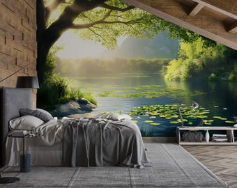 May include: A bedroom with a scenic mural of a lake and trees. The bed has gray bedding and pillows. A black lamp stands next to the bed. The room has a wooden accent wall and a gray rug.