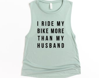 I Ride My Bike More Than My Husband - Womens Muscle Tank with Sayings - Cycling Shirt - Exercise Shirt - Fitness Shirt - Bike Muscle Shirt