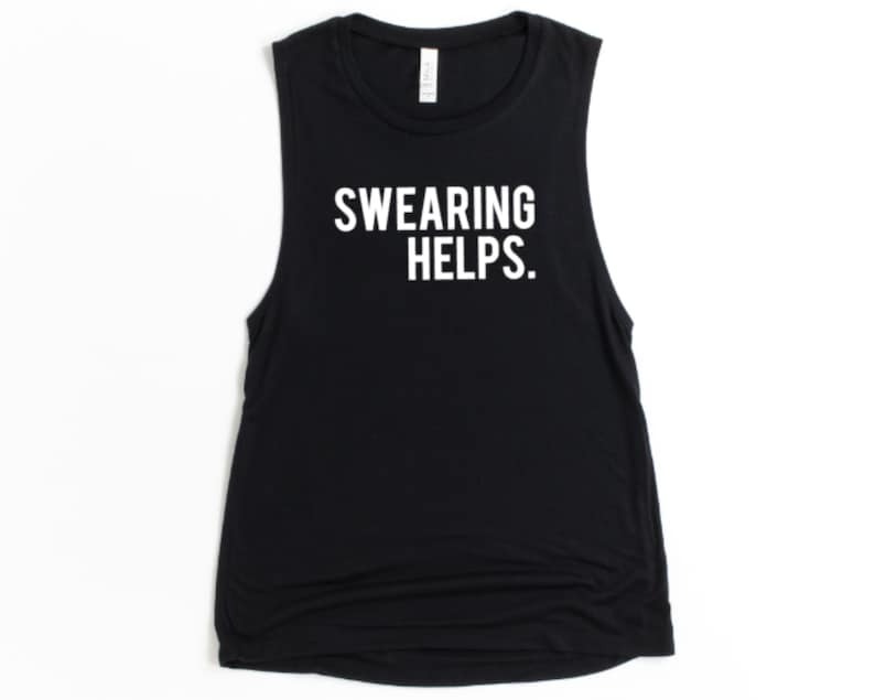 May include: Black muscle tank top with the text "SWARING HELPS." in white block letters. The sleeveless top is made of a soft material and is suitable for casual wear or workouts.