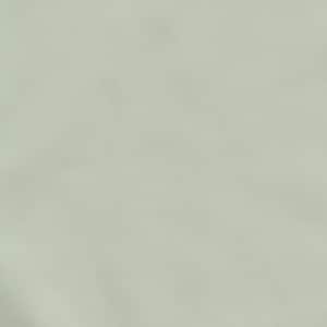 May include: A smooth, light green fabric with a subtle sheen. The fabric is slightly wrinkled, creating a soft, flowing texture.