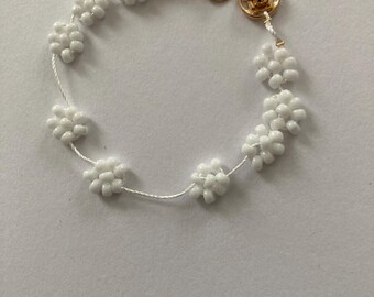Pulsera con diseño de margarita para muñeca o tobillo.