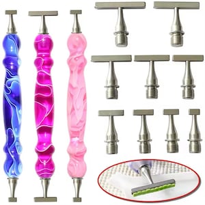 May include: A collection of diamond painting tools. Three pens with colorful, swirled handles in blue, pink, and white, along with several metal applicator tips. A close-up shows a tool with a green brush.