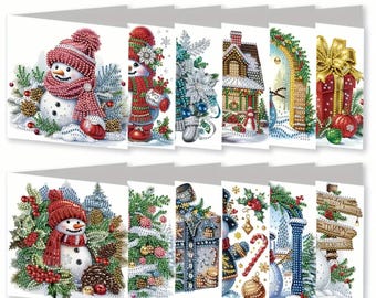 May include: A set of twelve square greeting cards featuring diamond art designs of Christmas themes including snowmen, decorated houses, gift boxes, pine trees, candy canes, and festive greenery with sparkling accents on a white background.
