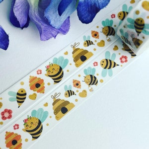 Abeilles surveillant le miel, ruches et seaux de miel, rouleau de ruban adhésif printanier