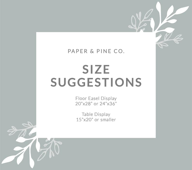 May include: A white rectangle with gray text on a light gray background. The text reads "PAPER & PINE CO. SIZE SUGGESTIONS Floor Easel Display 20"x28" or 24"x36" Table Display 15"x20" or smaller". The rectangle is surrounded by white floral designs.