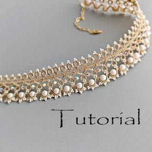 May include: A gold-colored lace choker necklace with white pearls and iridescent crystals. The necklace is on a gray background. The word "Tutorial" is written in black script at the bottom of the image.