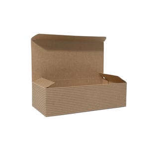 May include: A brown cardboard box with a corrugated texture. The box is open and the lid is folded back. The box is empty.