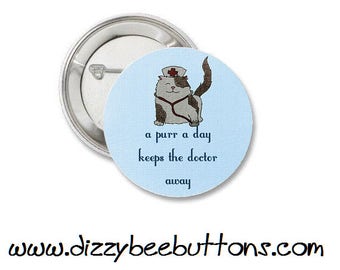 Nurse Kitty Cat says A Purr A Day Keeps The Doctor Away! - Pinback Button - Magnet - Keychain - Cat Cats Kitten Purr Nurse Nursing Doctor Dr