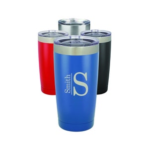 May include: Four stainless steel tumblers with lids. The tumblers are in red, blue, silver, and black. The blue tumbler has the name "Smith" and the initial "S" engraved on it.