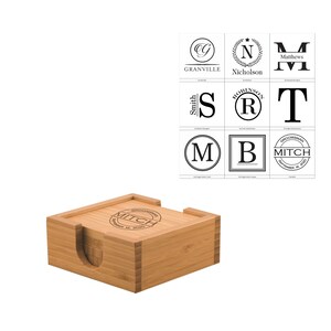 May include: Set of four bamboo coasters with a square wooden holder. Each coaster features a personalised monogram in a circle with a name and date. The coasters are engraved with the text "Groomsgman Mitch September 14, 2020".