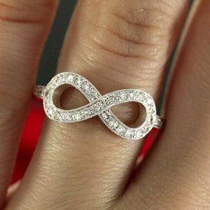 Diamond Infinity Knot Ring: 14k White Gold Milgrain, 0.25ctw
