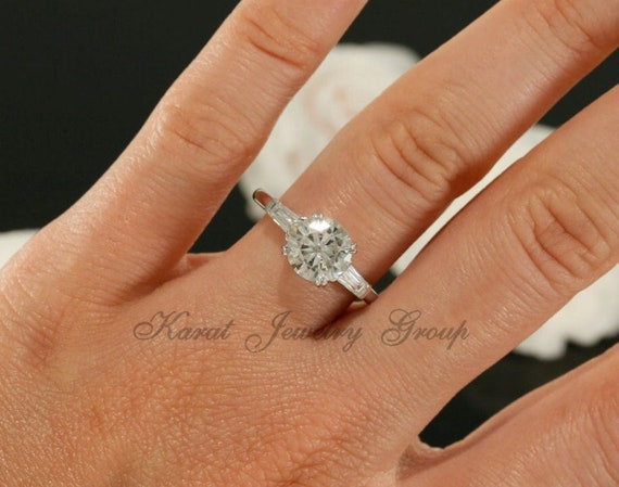 7.5mm Round Forever One and Two Tapered Baguette Moissanite Three