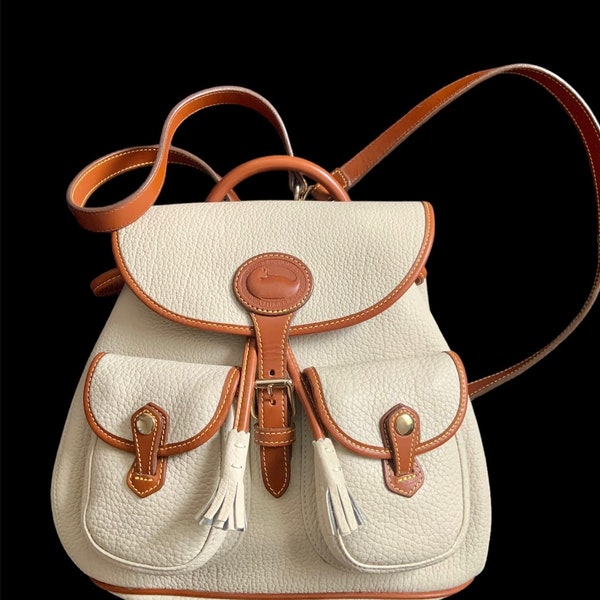 Vintage Dooney and Bourke R515 AWL Canyon Backpack Drawstring shoulder bag Bone and British tan trim