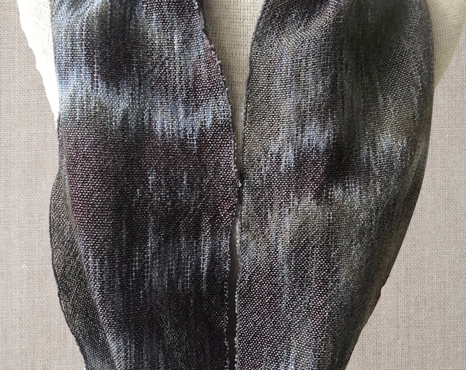 Hand-dyed, handwoven cotton and rayon infinity scarf, 9" x 56", in shades of black, charcoal, grey, silver blue, and pale blue