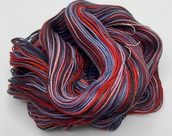 Hand-dyed 6.5/3 mercerized cotton, 262 yard skeins, in shades of black, grey, blue, light blue, red, and pink - DY217