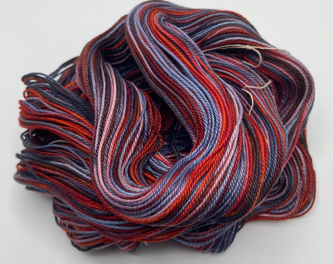 Hand-dyed 6.5/3 mercerized cotton, 262 yard skeins, in shades of black, grey, blue, light blue, red, and pink - DY217