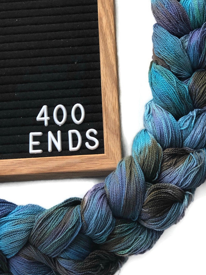 Hand-dyed, pre-wound weaving warp chain, 8/2 ring spun cotton, 3 3/4 yards, multiple ends, in shades turquoise, lavender, and brown DW265 400 ends