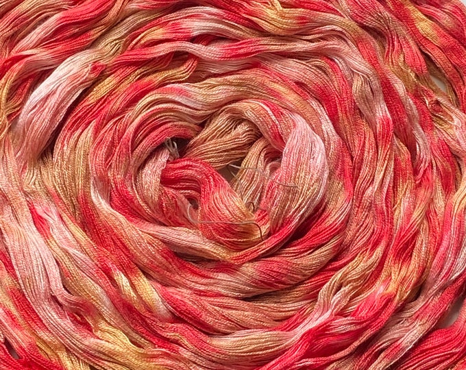 Hand-dyed, pre-wound weaving warp chain, 5 7/8 yards, 16/2 rayon, in shades of red, pink, orange-red, golden beige, and light brown - DW269