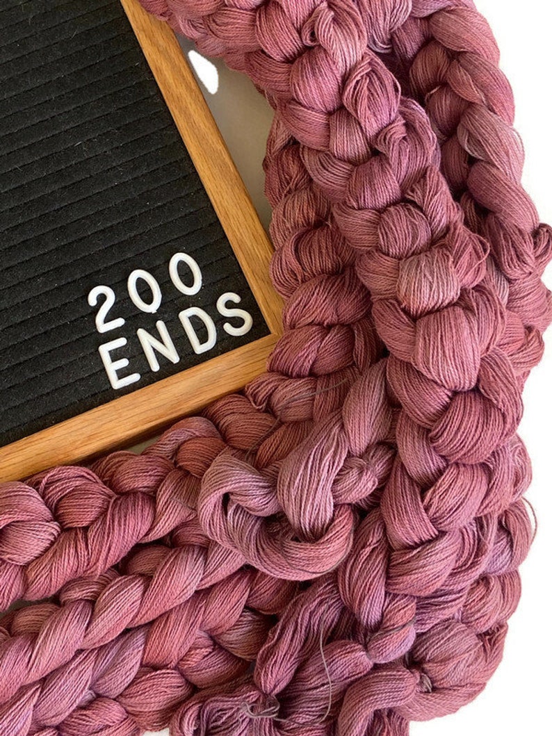 Hand-dyed, pre-wound weaving warp, 14/2 cotton, 6 7/8 yards, multiple ends, in tonal shades of old rose, blush, and pink lavender DW274 200 ends