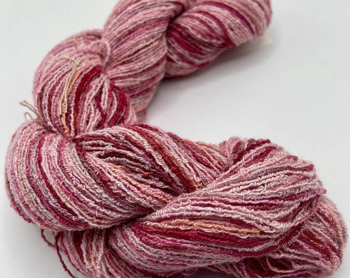 Hand-dyed rayon boucle yarn, 350 yard skeins, in shades of pinks, rose, burgundy, maroon, and peach - DY208