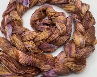 Hand-dyed pre-wound weaving warps, 24/3 cotton, 4 7/8 yards, in shades of purple, lavender, golden brown, brown, peach, and natural - DW301