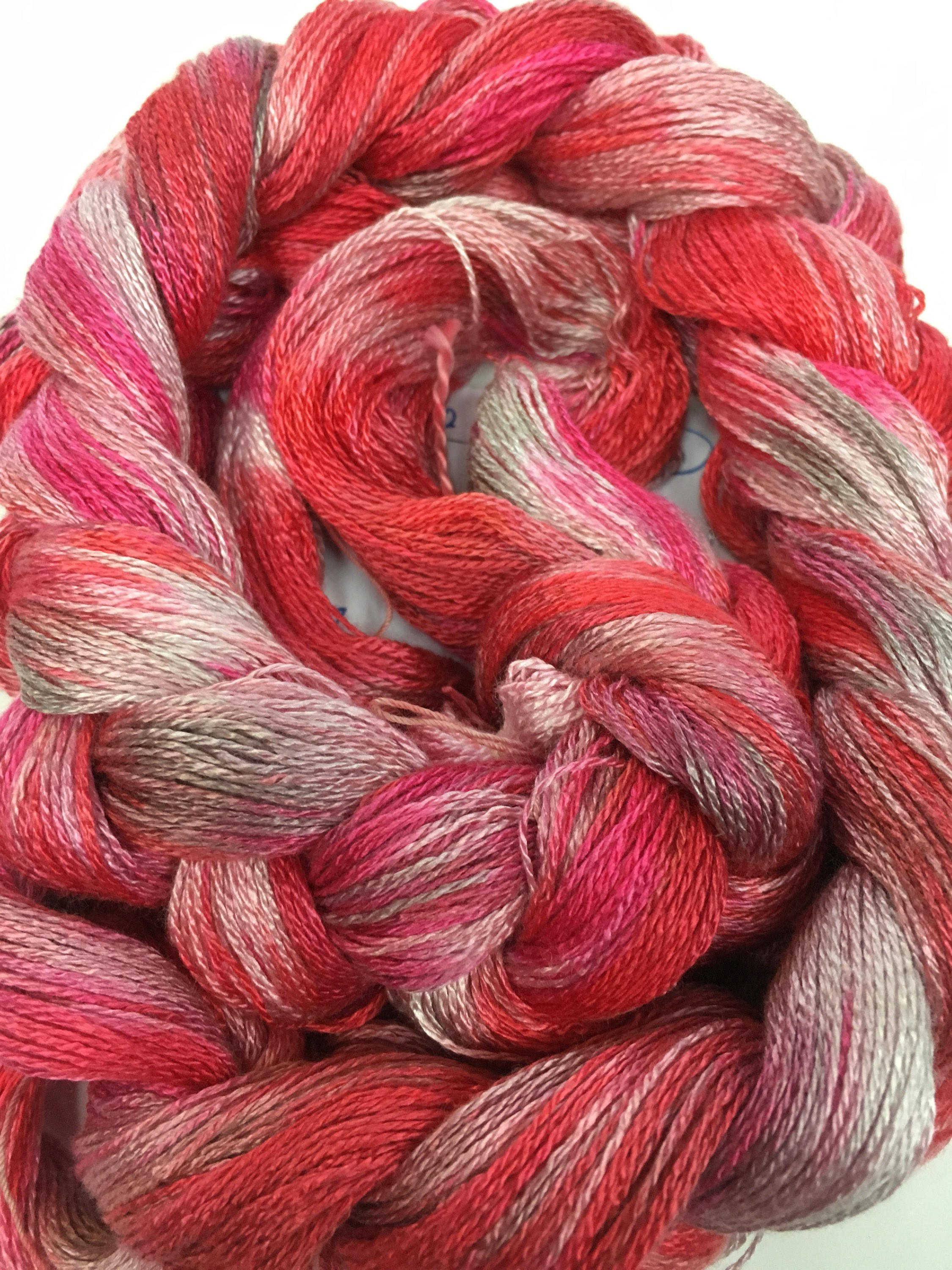 Handdyed, prewound warp, 8/2 rayon weaving warp, 200 ends, 3 7/8