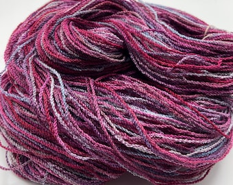 Hand-dyed 8/2 cotton rayon, 390 yard skeins, in shades of purple, red purple, lavender, blue, and light blue - DY201