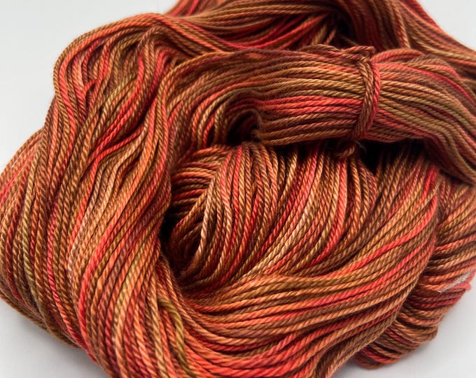 Hand-dyed 6.5/3 mercerized cotton, 262 yard skeins, in shades of brown, peach, salmon, beige, rust, and coral - DW221