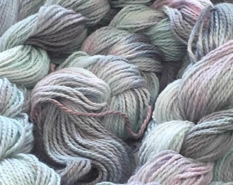 Hand-dyed, pre-wound weaving warp, 4/2 cotton, 100 ends, 7 7/8 yards long, in shades of light blue, grey, and pink -DW46