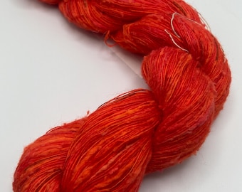Hand-dyed 5.5/1 rayon and cotton slub yarn, 437 yard skeins, in tonal shades of dark bright orange with small bits of brown - DY203
