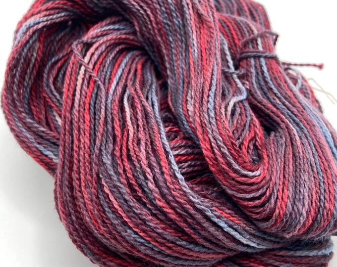 Hand-dyed 4.5/2 cotton, 262 yard skeins, in shades of red, grey, grey blue, pink, light blue, and burgundy - DY195