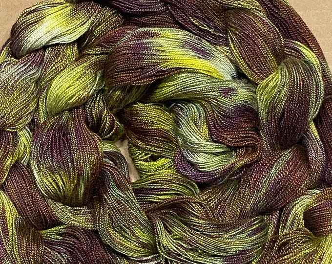 Hand-dyed pre-wound weaving warp, 8/2 rayon, 4 3/4 yards, multiple ends, in shades of purple, greens, brown, bronze, yellow, and white-DW292