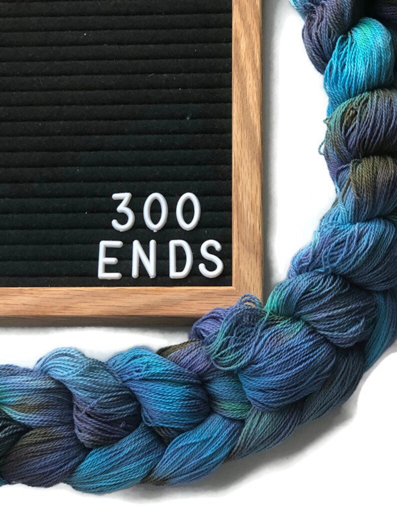 Hand-dyed, pre-wound weaving warp chain, 8/2 ring spun cotton, 3 3/4 yards, multiple ends, in shades turquoise, lavender, and brown DW265 300 ends