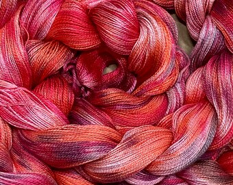 Hand-dyed pre-wound weaving warps, 16/2 cotton, 4 7/8 yards, multiple ends, in shades of red, pink, coral, salmon, red purple, grey -DW296