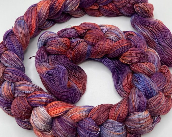 Hand-dyed pre-wound weaving warp, 14/2 cotton, 4 7/8 yards, in shades of purple, flame, blue, taupe, orange red, burgundy, and natural-DW305