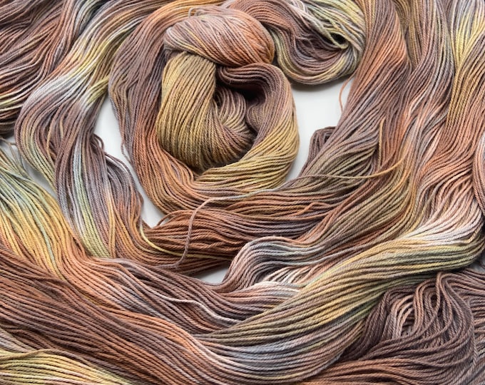 Hand-dyed pre-wound weaving warp, 10/3 cotton, 4 3/4 yards, in shades of grey, brown, straw, peach, khaki, taupe, and natural - DW302