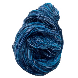 Hand-dyed cotton yarn, 2 ply, 400 yard skeins, in shades of dark charcoal, blue, turquoise, and grey